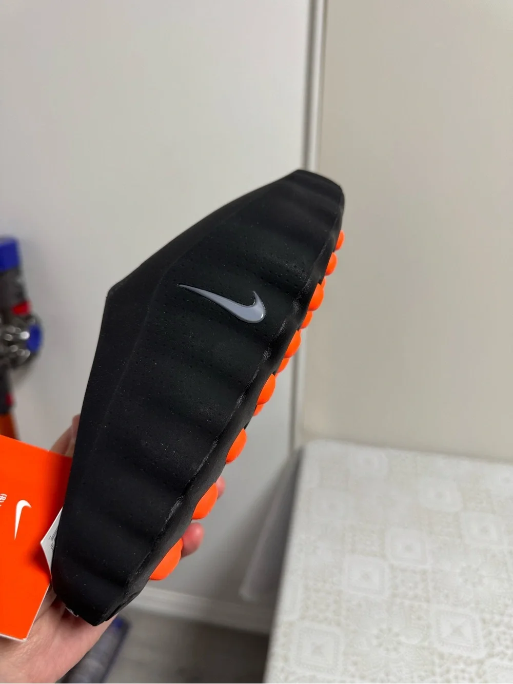 Brand new!They run SMALL! Nike Black Slip-On Mule with Bright Orange Studded Sol